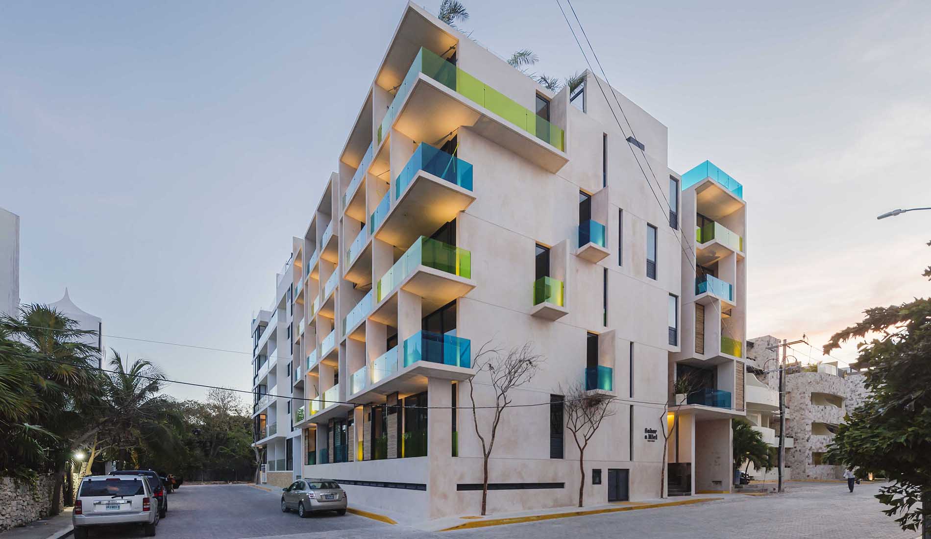 Restoration of a modern building with colorful balconies in Yucatan, where Chukum stucco techniques have been applied.