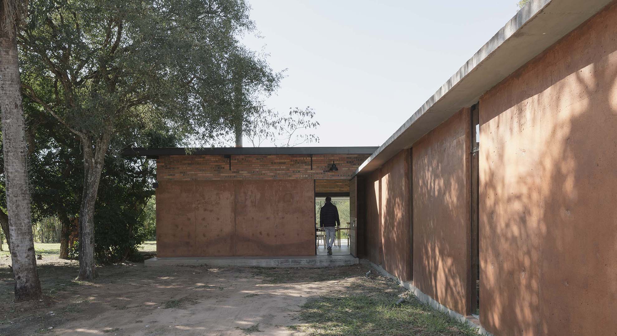 Exterior of Luce and Pablo House, built using reuse of local soil and traditional construction techniques.