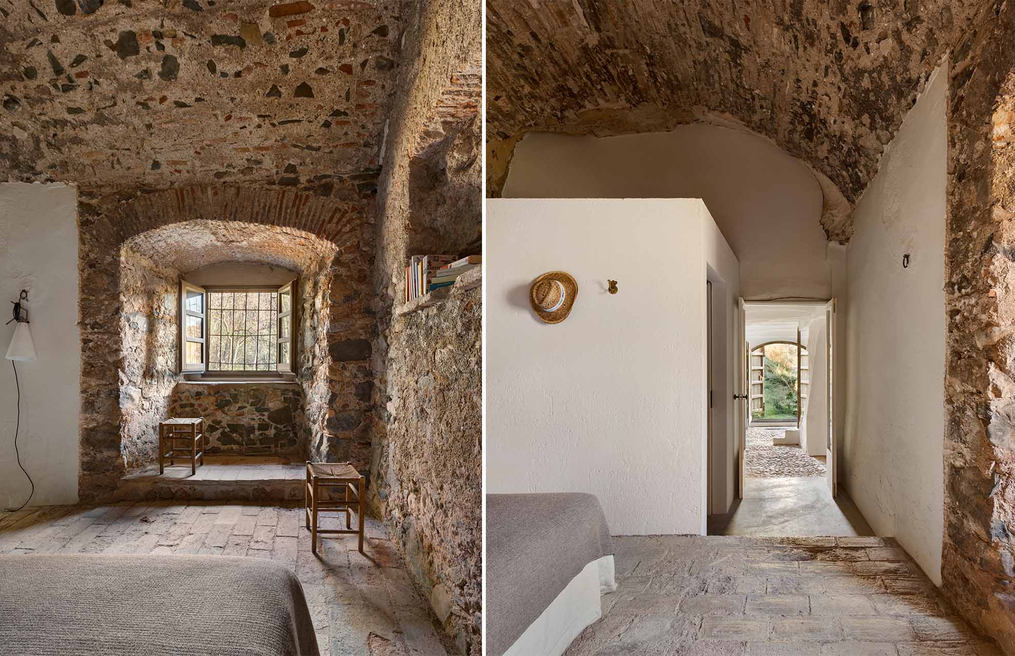 Bedroom and hallway inside a renovated stone house, blending rustic textures and original building materials with minimal contemporary additions.